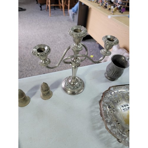 370 - Quantity of plated ware inc a plated hand mirror, clothes brush, three tier table candelabra, wooden... 