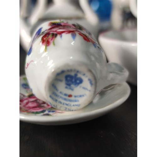 388 - A large quantity of various collectable items to include various china and glass bells, Wedgwood ite... 