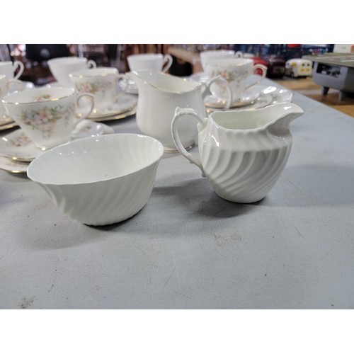 372 - Box containing a large quantity of china inc a white duchess bone china part tea set along with a La... 