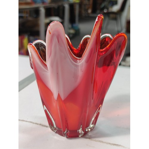 394 - A vintage amber glass chalice and a red and white handkerchief vase. Both in good condition with no ... 