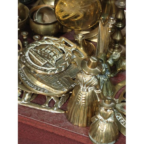 398 - A very large quantity of mostly collectable brass items to include candlesticks, a traditional Welsh... 