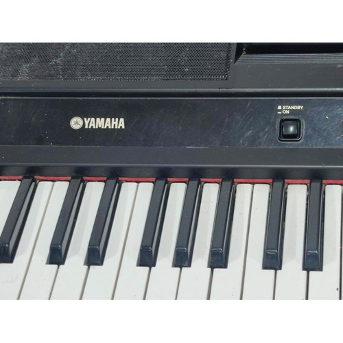 401 - A Yamaha YPP-200 full scale 88 key keyboard with stand. Includes power supply and sustain pedal.