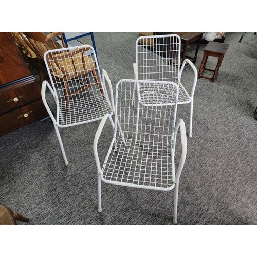 572 - 3 white painted metal outdoor chairs.