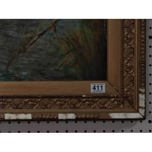 411 - A gilt framed oil painting of mallard ducks in flight across a river scene. Gilt frame has some loss... 