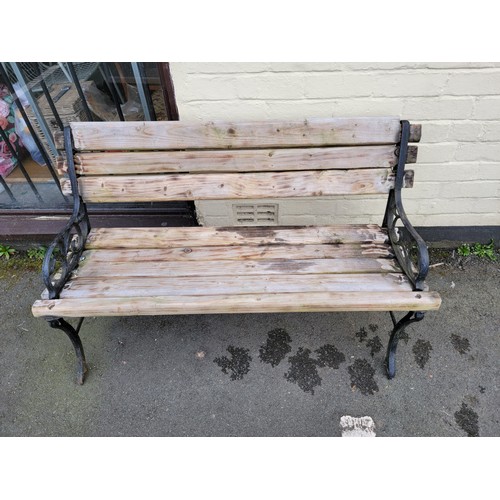 576 - Cast iron ended park bench with good thick timbers to seat and back nice and sturdy with great patin... 