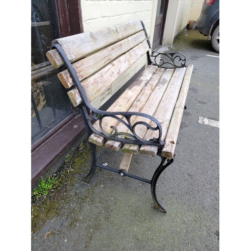 576 - Cast iron ended park bench with good thick timbers to seat and back nice and sturdy with great patin... 