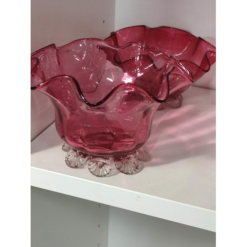 421 - Large qty of cranberry glass items to include baskets, sugar sifter etc, all but 2 pices are in good... 