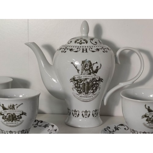 424 - Unused rare Hendrick's A Most Unusual Gin tea set. Two cups have been repaired. Complete with origin... 