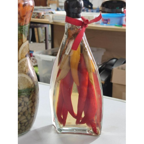 432 - Vintage Italian vinegar infused decorative bottles.