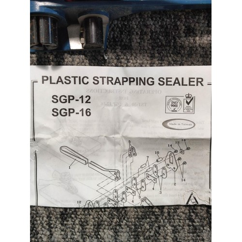 443 - Crate containing plastic strapping sealer along with a plastic strapping tensioner for wrapping larg... 