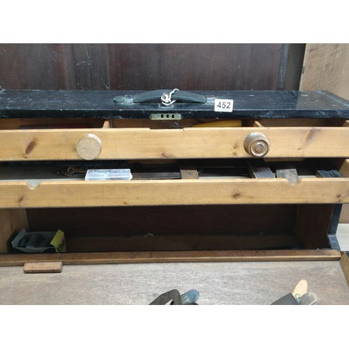 452 - Good quality vintage black wooden carpenters box with two drawer inside containing a quantity of too... 