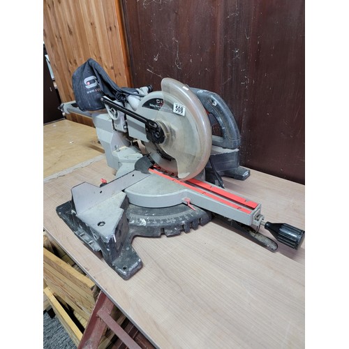 508 - Good quality bench top sliding meter saw complete with laser and dust bag