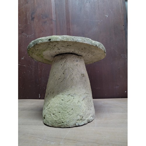 514 - Good quality sandstone saddlestone with removable top, stands at 36cm high