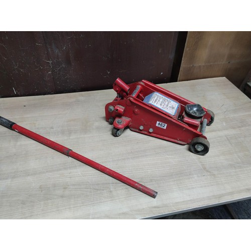 462 - A mini hydraulic trolley jack, capacity 3000lbs made by Draper.