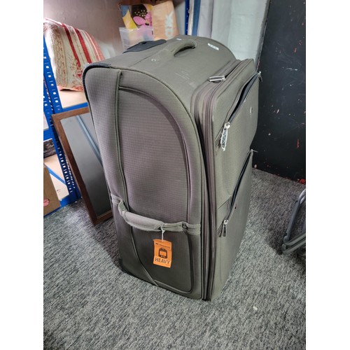 523 - Large green travel suitcase