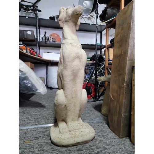 528 - Large tall concrete greyhound figure in good order sitting up stands at 80cm high, 26cm wide and 26c... 