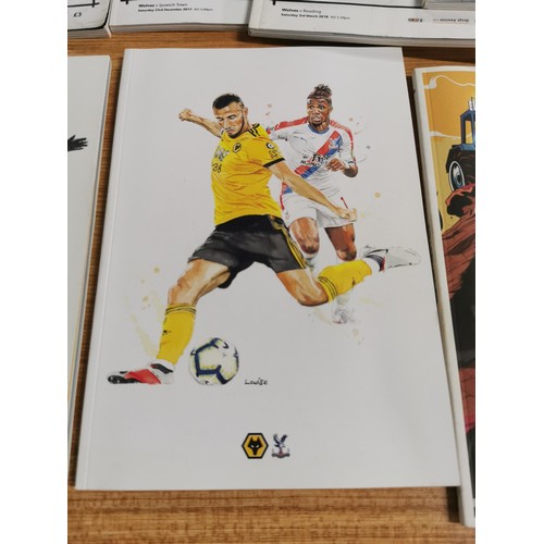 130 - A large selection of Wolverhampton Wanderers football programmes including the Emirates FA cup quart... 