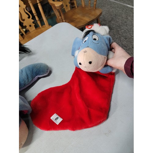 8 - 3x Disney Eeyore soft toys to include 1x large Eeyoreby Jemini, a christmas stocking Eeyore and 1x o... 