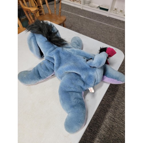 8 - 3x Disney Eeyore soft toys to include 1x large Eeyoreby Jemini, a christmas stocking Eeyore and 1x o... 