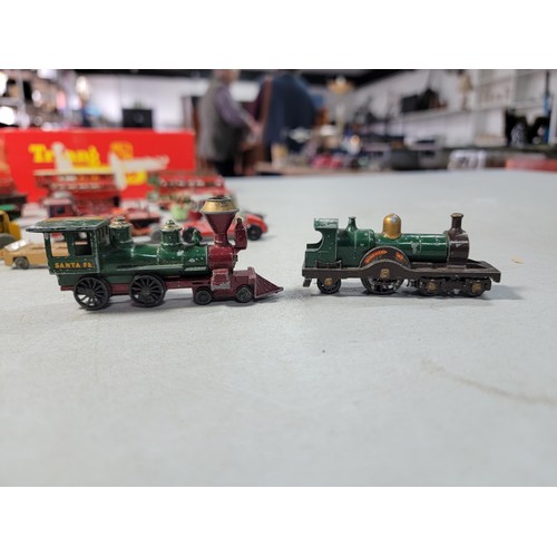 18 - Collection of Diecast vehicles to include trucks, buses, cars and trains with various brands, Yester... 