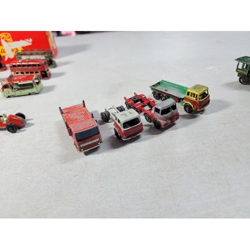 18 - Collection of Diecast vehicles to include trucks, buses, cars and trains with various brands, Yester... 