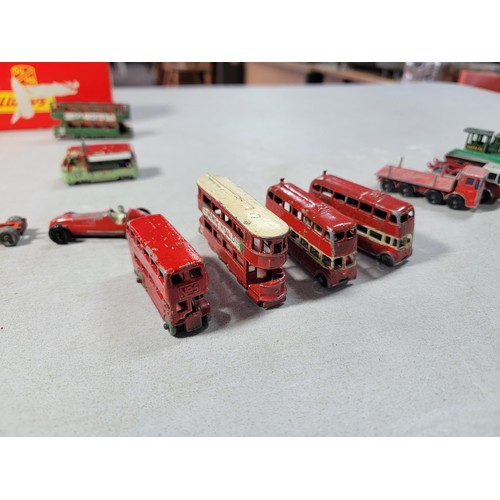 18 - Collection of Diecast vehicles to include trucks, buses, cars and trains with various brands, Yester... 