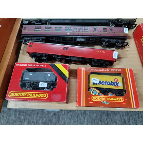 23 - Collection of model railway items to include Hornby Railway rolling stock, coaches, Hornby Intercity... 