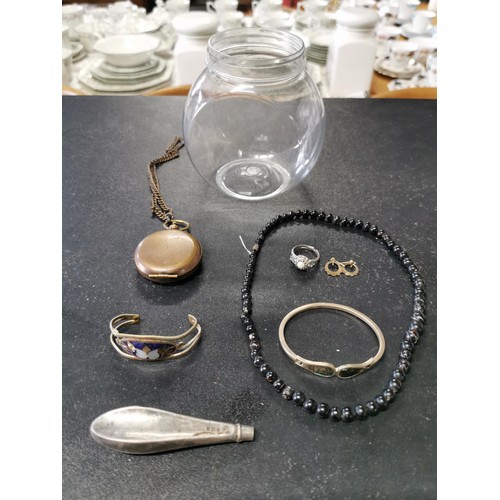 164 - A small quantity of collectables including a vintage beaded necklace a plated solitaire ring with fa... 