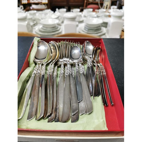 165 - A quantity of boxed plated cutlery including a boxed fish set for 6 persons, a boxed soup spoon set ... 