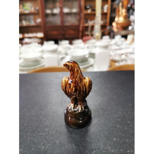 168 - A Beswick golden eagle decanter containing Beneagles whisky, a carltonware high whisky jug and a sma... 