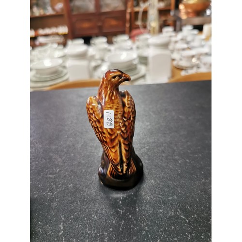 168 - A Beswick golden eagle decanter containing Beneagles whisky, a carltonware high whisky jug and a sma... 