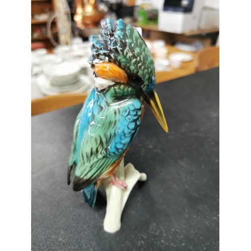 169 - A glazed Goebbels kingfisher figurine along with 2 German Shepherd figurines. All in good condition ... 