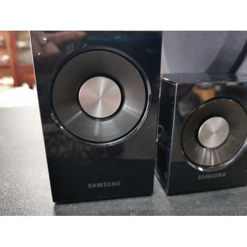 175 - A Samsung surround sound audio system. In great working condition complete with all its separate spe... 