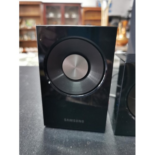 175 - A Samsung surround sound audio system. In great working condition complete with all its separate spe... 