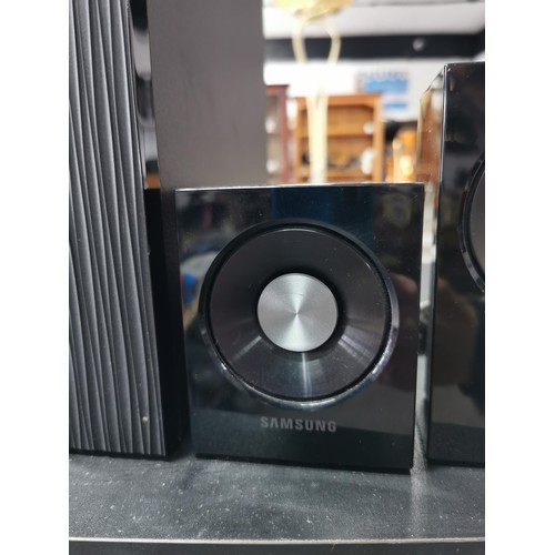 175 - A Samsung surround sound audio system. In great working condition complete with all its separate spe... 