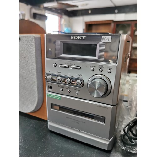 183 - Sony microsystem with cd, cassette, radio. Speakers included. Good working order