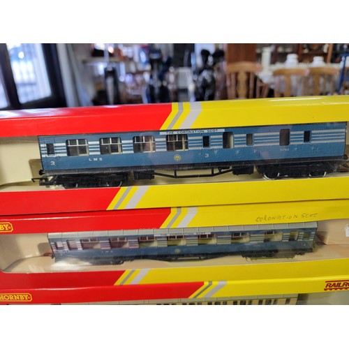 52 - 8x Boxed assorted coaches includes 3x lovely blue and silver Scott coaches, intercity MK3 and buffet... 