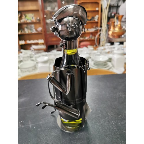 192 - wine bottle holder and wine bottle opener along with a metal steam punk swinging fruit basket