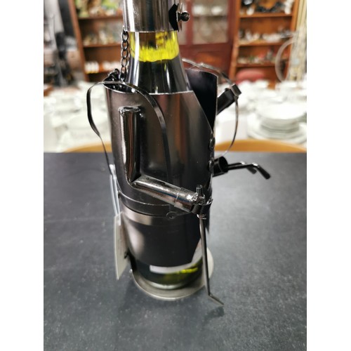 192 - wine bottle holder and wine bottle opener along with a metal steam punk swinging fruit basket