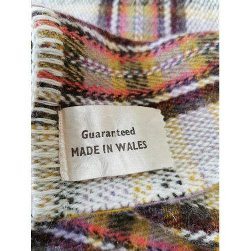 194 - A Welsh blanket giving great colours and in good overall condition, length 221cm width 181cm