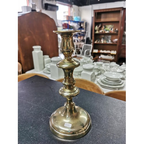 196 - Pair of brass candlesticks with spring loaded adjusters