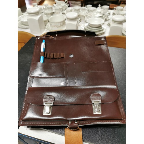 202 - 2 leather satchels, 1 in new condition the other a vintage item.