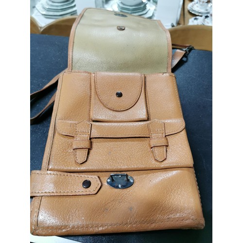 202 - 2 leather satchels, 1 in new condition the other a vintage item.