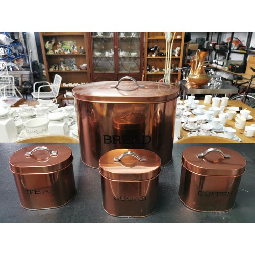 205 - A copper style bread bin along with a set of matching sugar, tea and coffee sets. All in great clean... 