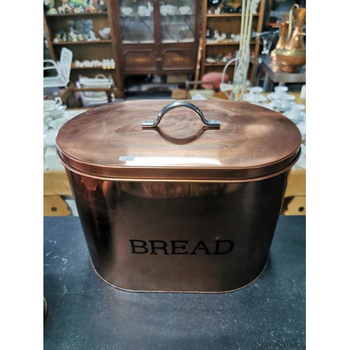 205 - A copper style bread bin along with a set of matching sugar, tea and coffee sets. All in great clean... 