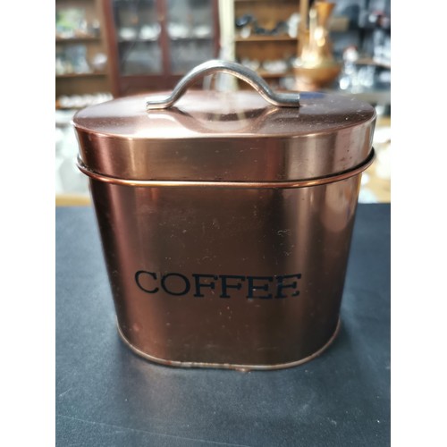 205 - A copper style bread bin along with a set of matching sugar, tea and coffee sets. All in great clean... 