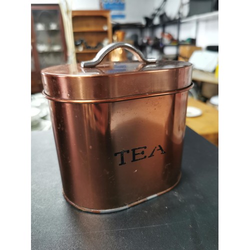 205 - A copper style bread bin along with a set of matching sugar, tea and coffee sets. All in great clean... 