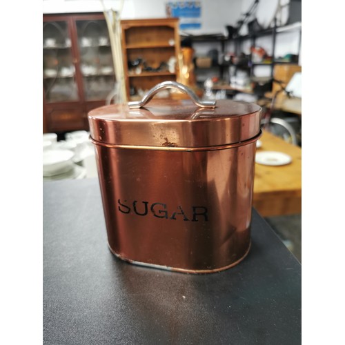 205 - A copper style bread bin along with a set of matching sugar, tea and coffee sets. All in great clean... 