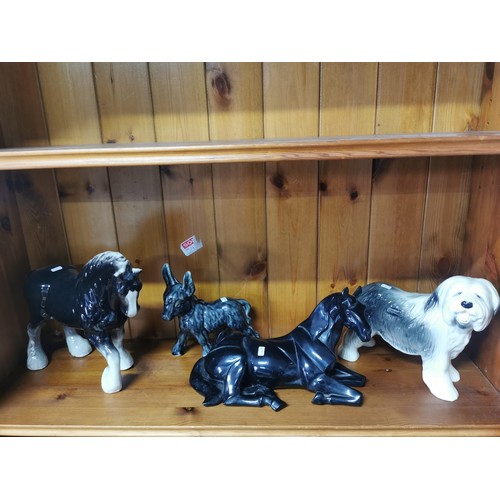 540 - Shelf of ceramic figures to include a cooper craft old english sheedog figure, a nicely glazed donke... 