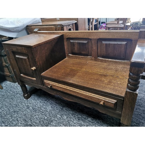 553 - Solid oak telephone table seat with drawer and cupboard in great condition with nice aged patina
109... 